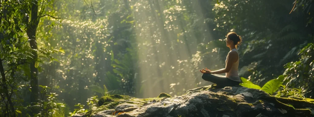 a person peacefully meditating in nature, surrounded by a lush green forest.